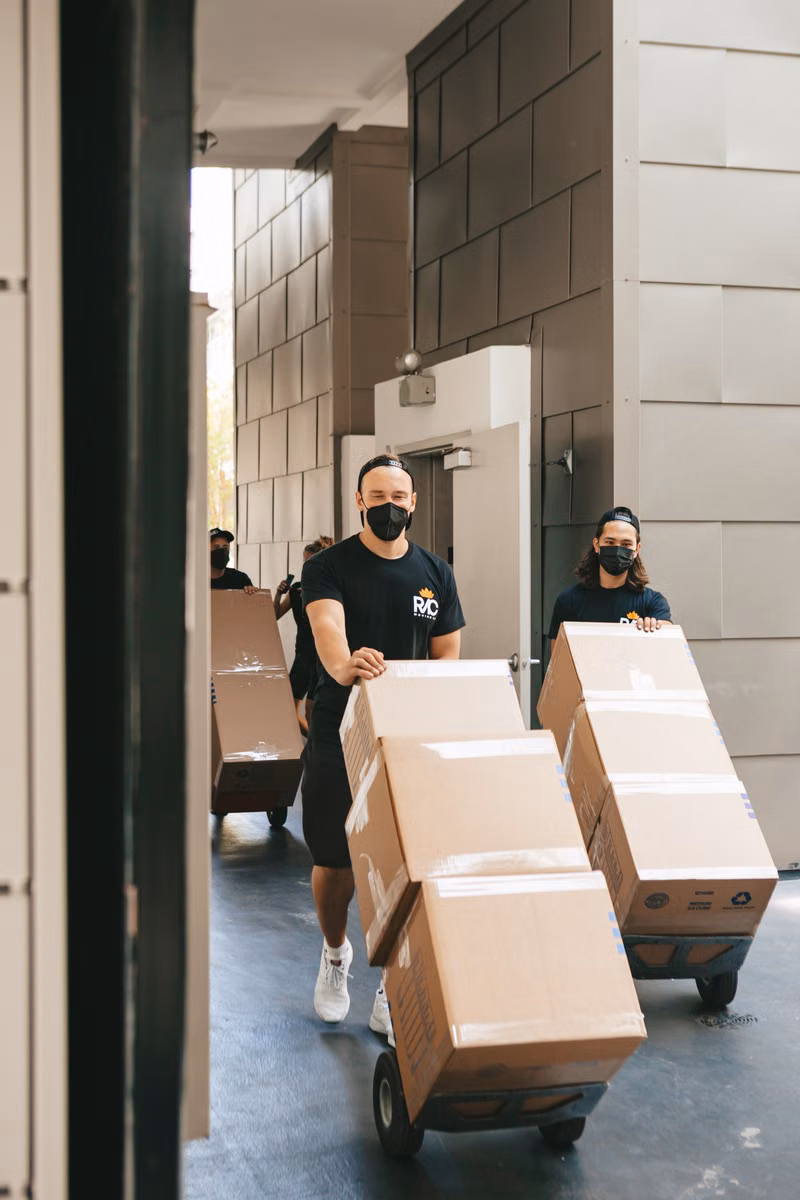 Professional crew hauling unwanted items from a commercial property